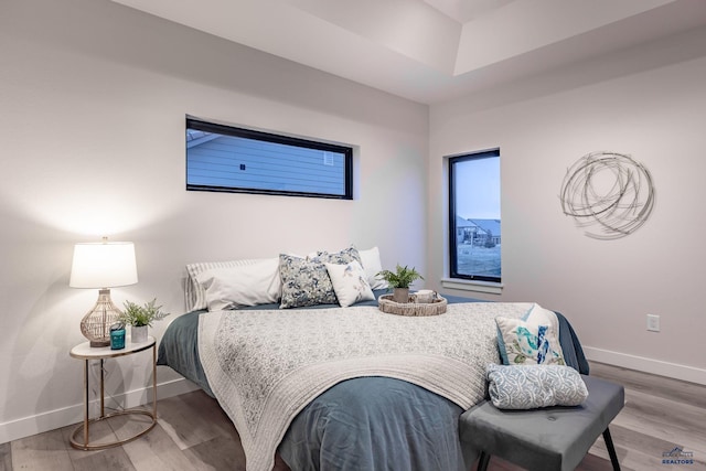 bedroom with light wood-type flooring