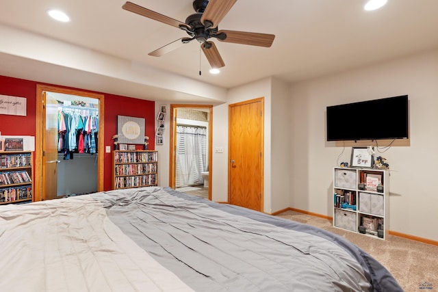 carpeted bedroom with ceiling fan