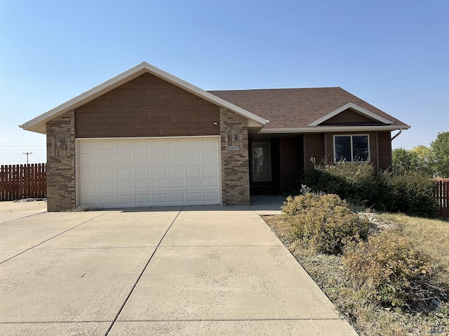 ranch-style home with a garage