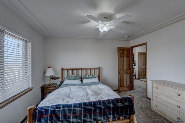 carpeted bedroom featuring ceiling fan