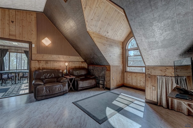 bonus room with wooden walls, wooden ceiling, and vaulted ceiling