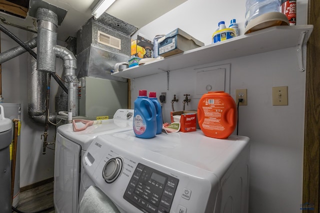 washroom with washer and clothes dryer