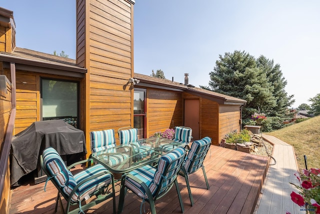 wooden terrace with grilling area