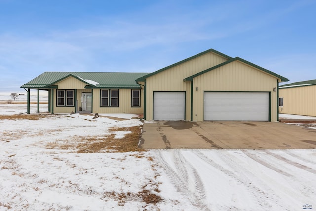 single story home featuring a garage