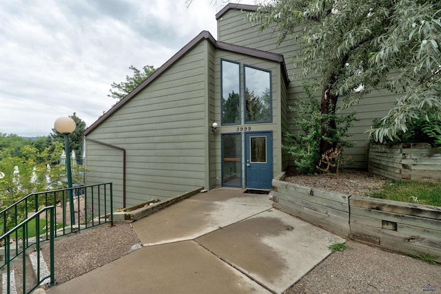 back of property featuring a patio area