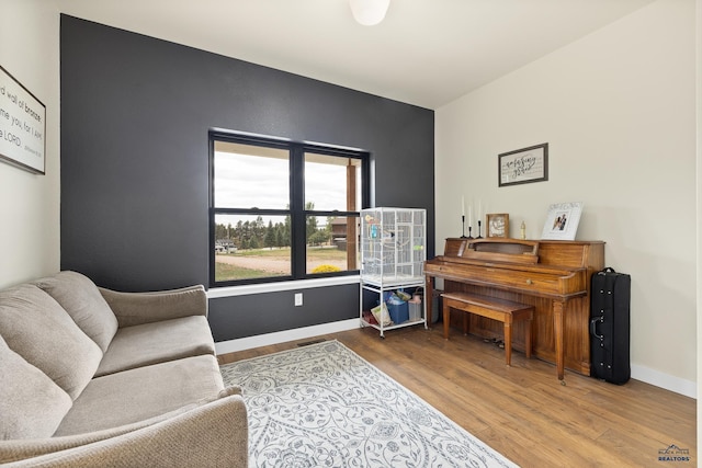 living area featuring hardwood / wood-style floors