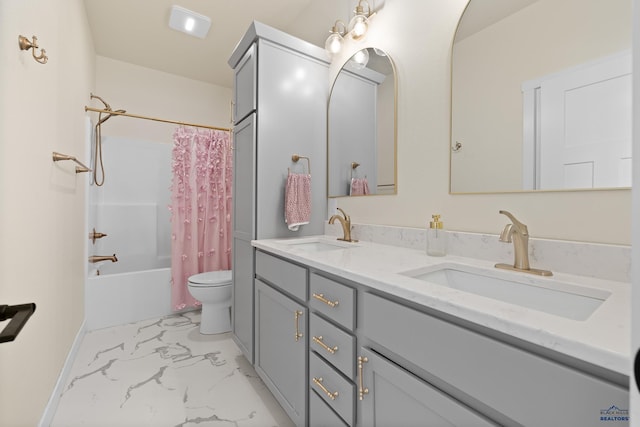 full bathroom with vanity, toilet, and shower / bath combo with shower curtain