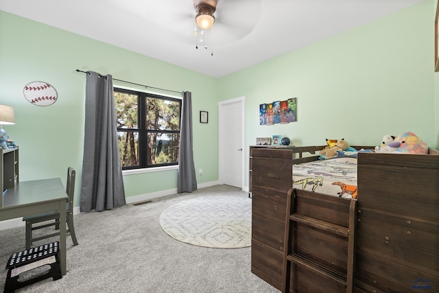 bedroom featuring light colored carpet and ceiling fan