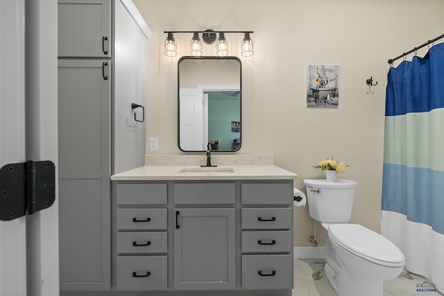 bathroom with a shower with curtain, vanity, and toilet