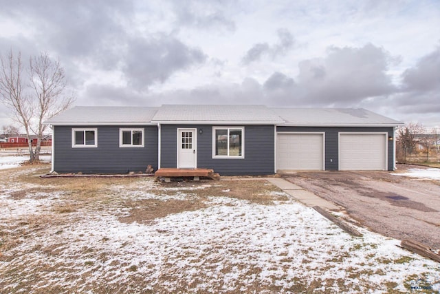 ranch-style home with a garage