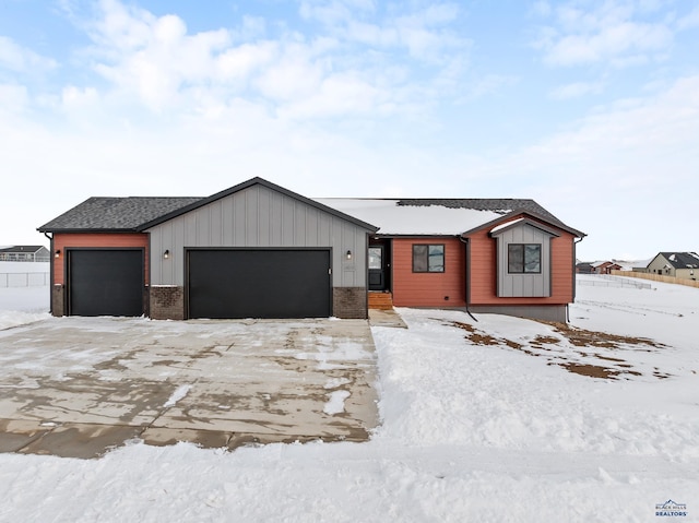 single story home featuring a garage