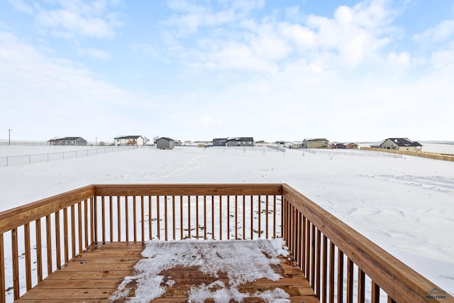 view of snow covered deck