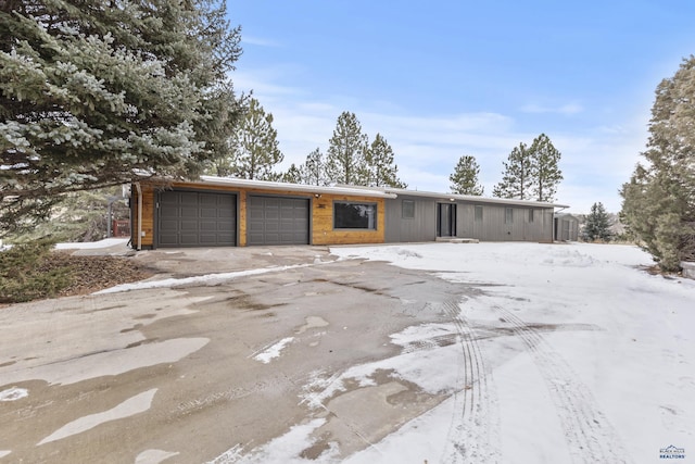 single story home featuring a garage