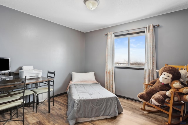 bedroom featuring light hardwood / wood-style floors