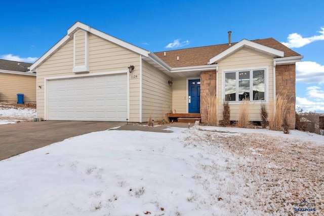 single story home featuring a garage