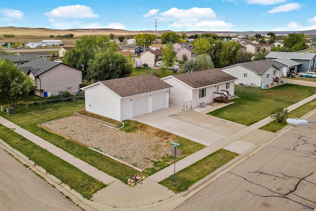 birds eye view of property with a mountain view