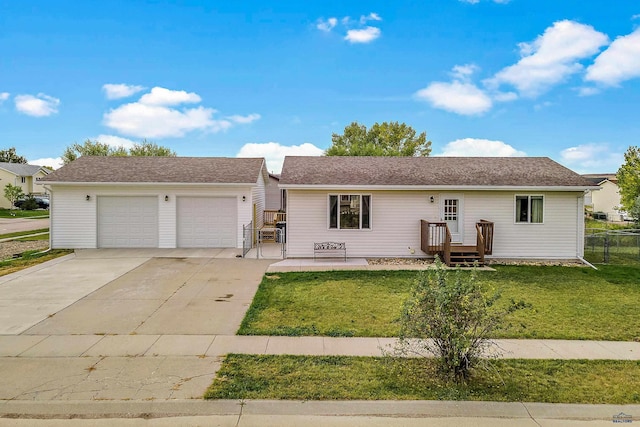 single story home featuring a garage and a front yard