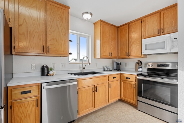 kitchen with sink and stainless steel appliances