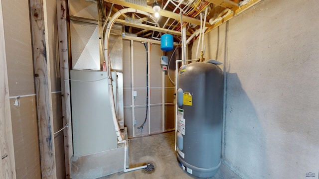 utility room with water heater