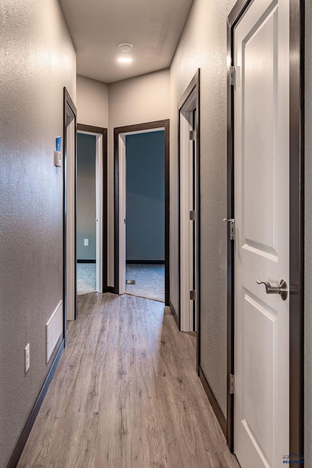 hall featuring light hardwood / wood-style floors