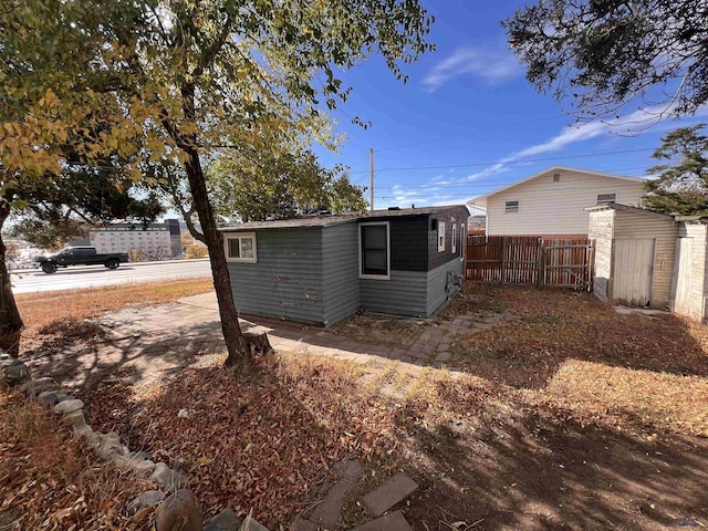 exterior space with a shed