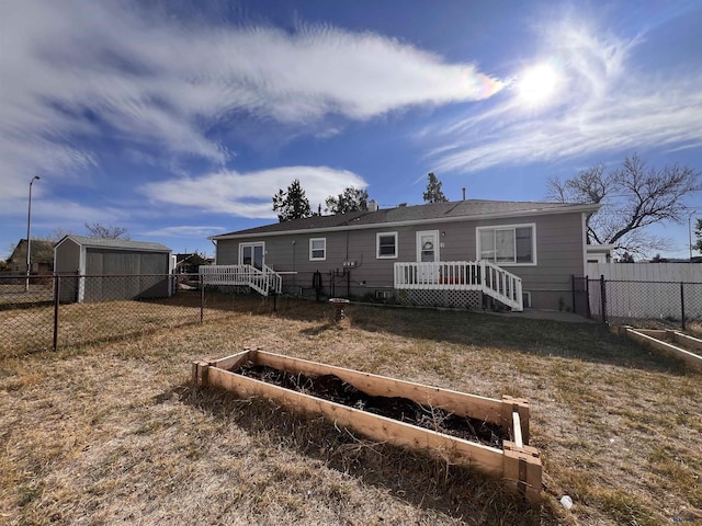 rear view of property with a lawn