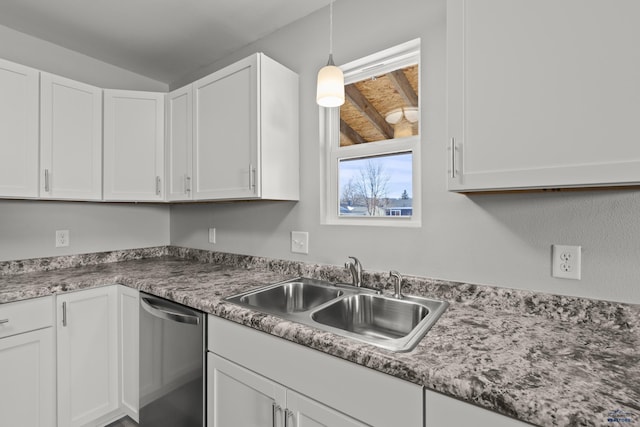 kitchen with sink, pendant lighting, white cabinets, and dishwasher