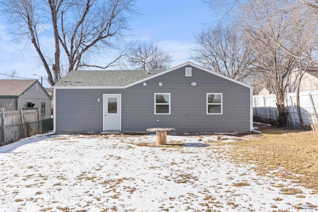 view of snow covered property