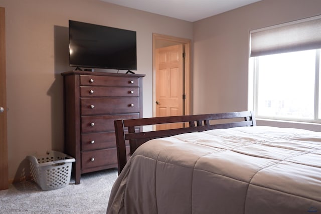 bedroom with light carpet