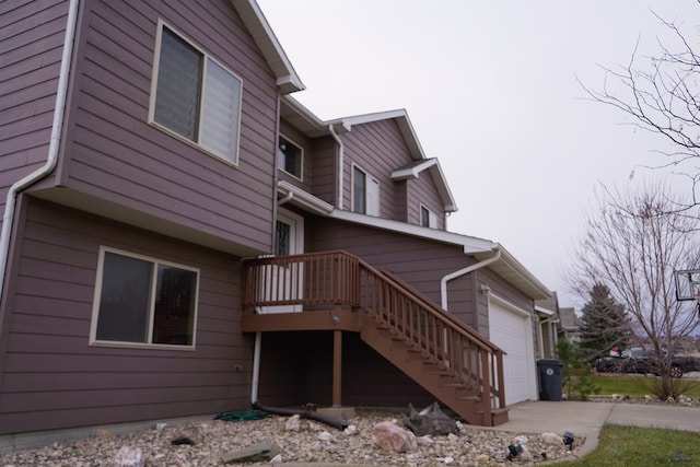 view of property exterior featuring a garage