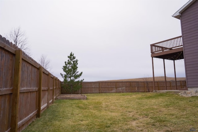 view of yard with a deck