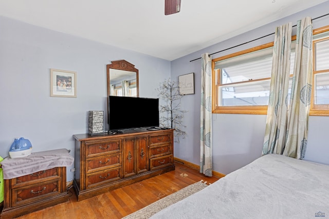 1002 Allen Ave, Rapid City, SD 57701 - bedroom with ceiling fan and light wood-type flooring