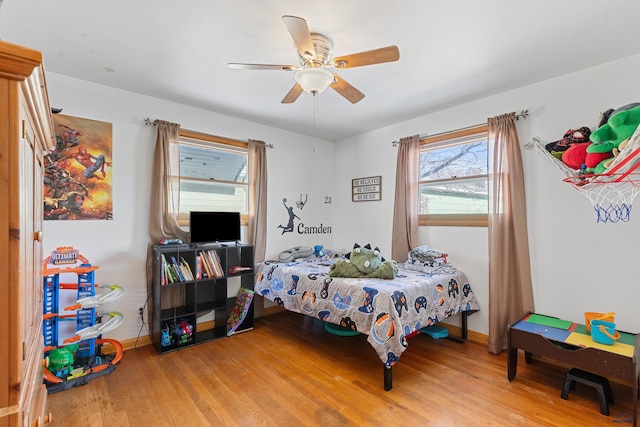 1002 Allen Ave, Rapid City, SD 57701 - bedroom with ceiling fan and light hardwood / wood-style floors