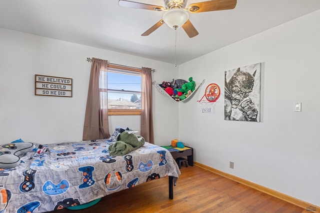 1002 Allen Ave, Rapid City, SD 57701 - bedroom with ceiling fan and hardwood / wood-style floors
