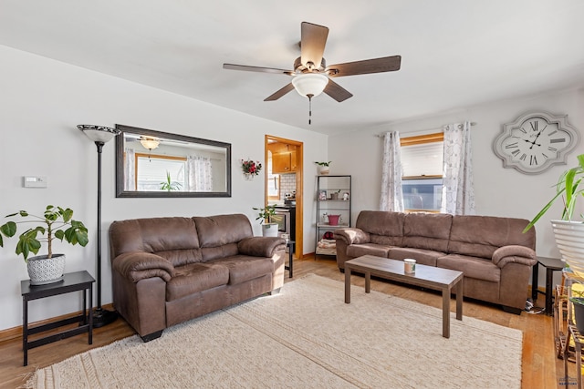 1002 Allen Ave, Rapid City, SD 57701 - living room with ceiling fan and light hardwood / wood-style floors