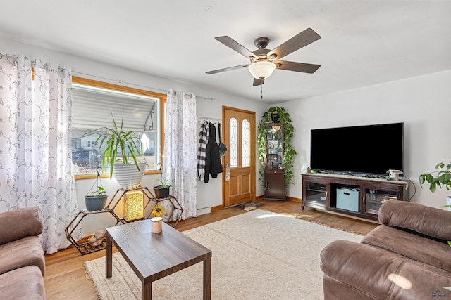 1002 Allen Ave, Rapid City, SD 57701 - living room with ceiling fan and light hardwood / wood-style flooring