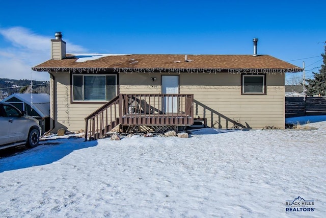 view of snow covered property