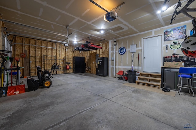 garage featuring a garage door opener