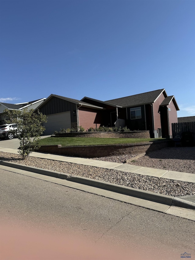 single story home featuring a garage