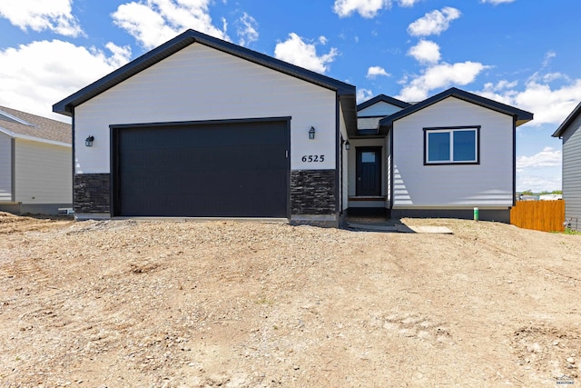 view of front of property featuring a garage