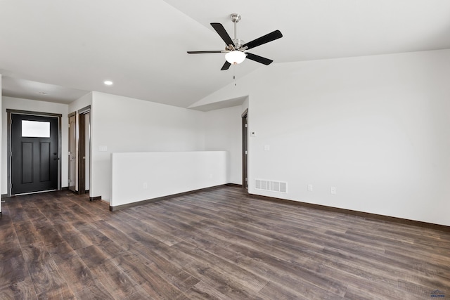 unfurnished room with ceiling fan, dark hardwood / wood-style flooring, and lofted ceiling