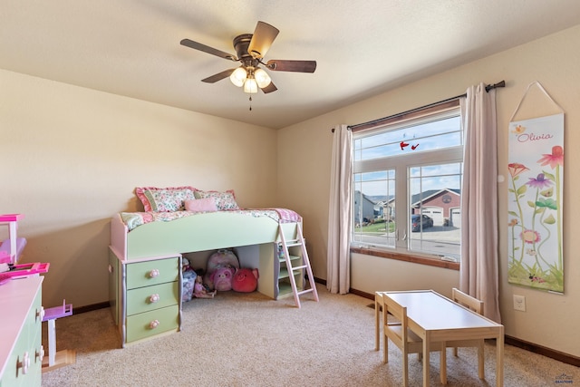 bedroom with light colored carpet and ceiling fan