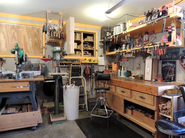 interior space featuring a workshop area