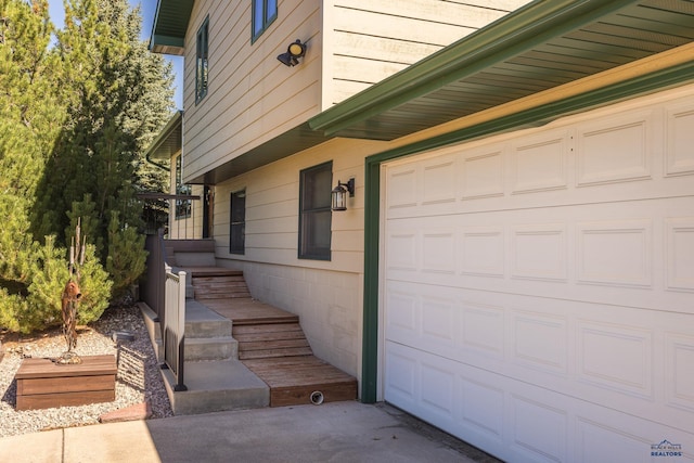 exterior space with a garage