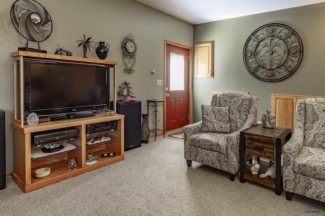 sitting room featuring light carpet