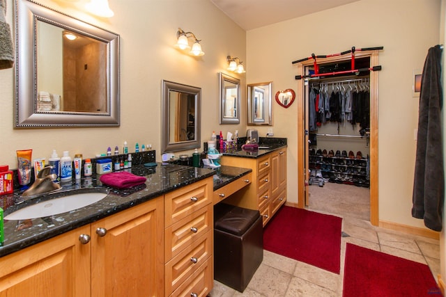 bathroom featuring vanity and tile patterned flooring