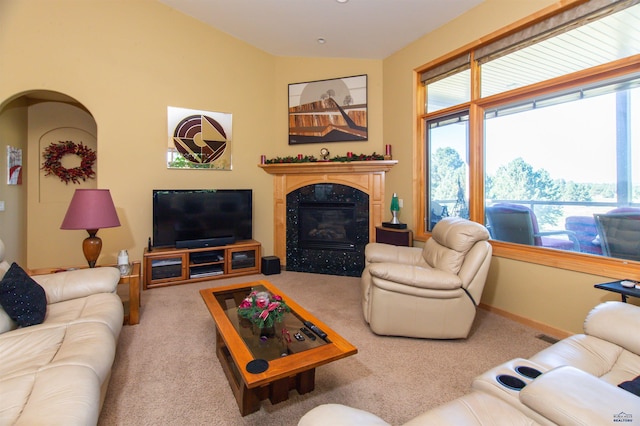 living room with carpet floors and lofted ceiling