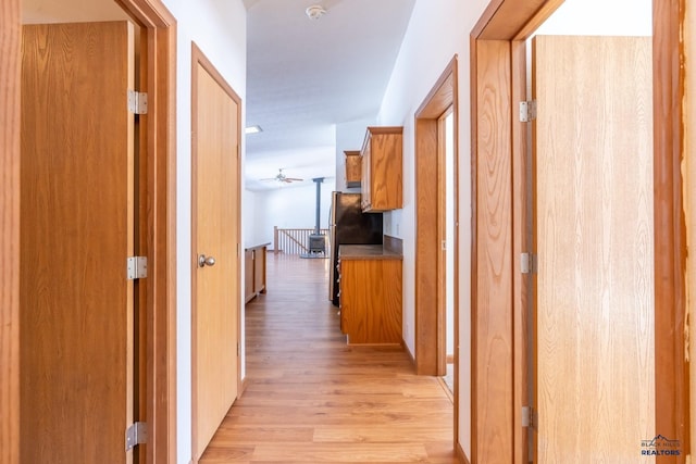 corridor featuring light hardwood / wood-style flooring