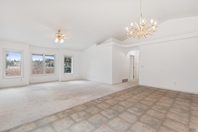 unfurnished living room with carpet floors, lofted ceiling, and ceiling fan with notable chandelier