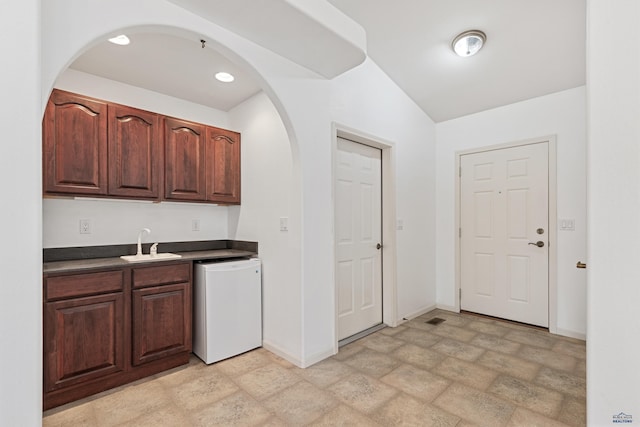 kitchen featuring sink and dishwasher